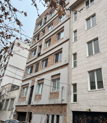 نمای ترکیبی ساختمان با آجر کرم و طوسی